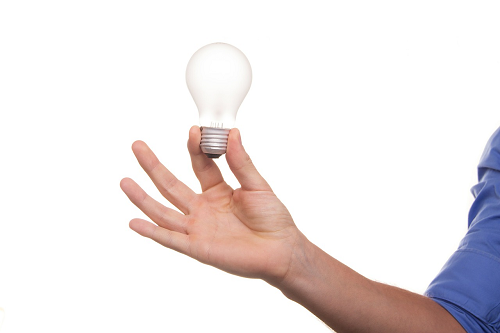 Man holding a lightbulb